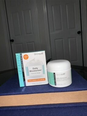 Skin Daily Moisturizer - White with Teal and Orange Accents